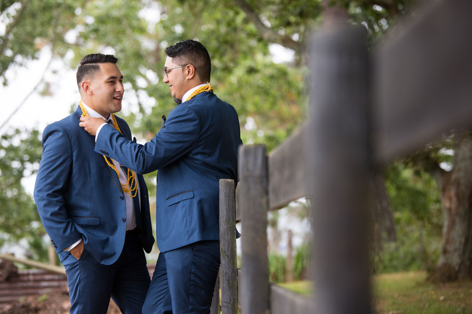 auckland wedding groom adjusting groom's collar