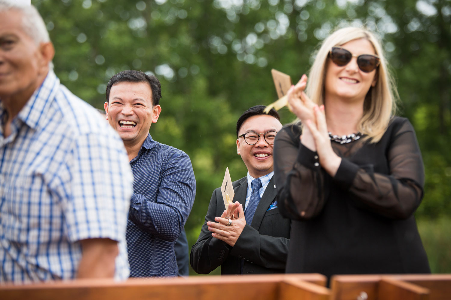 gracehill auckland wedding guest clapping and welcoming bridesmaids