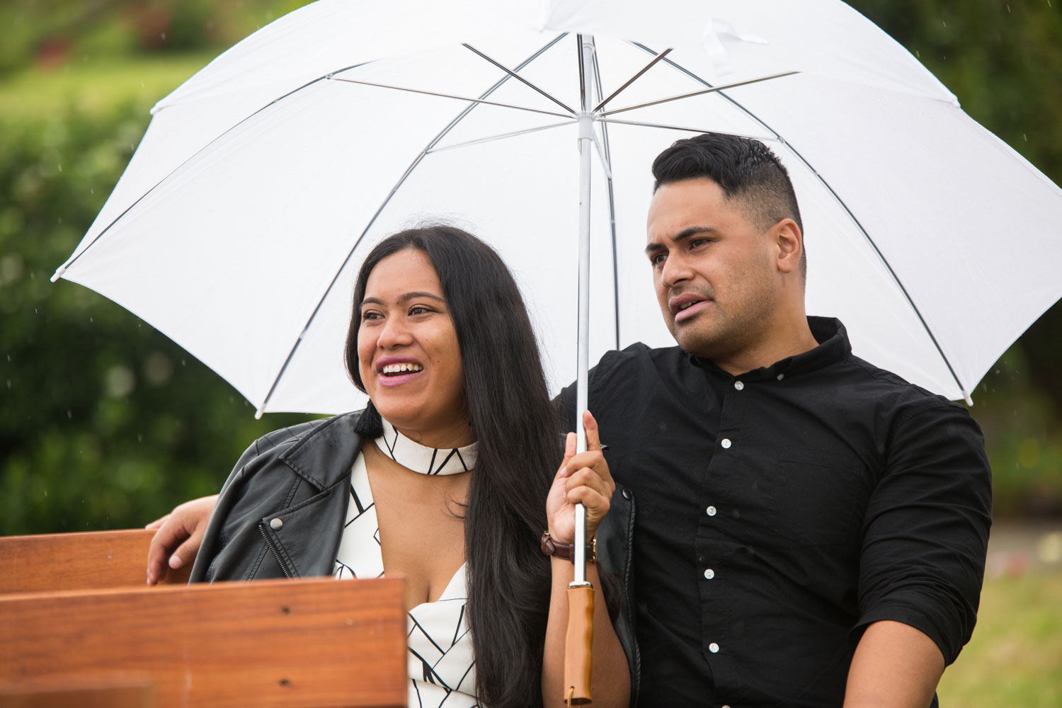 gracehill auckland wedding guest under an umbrella