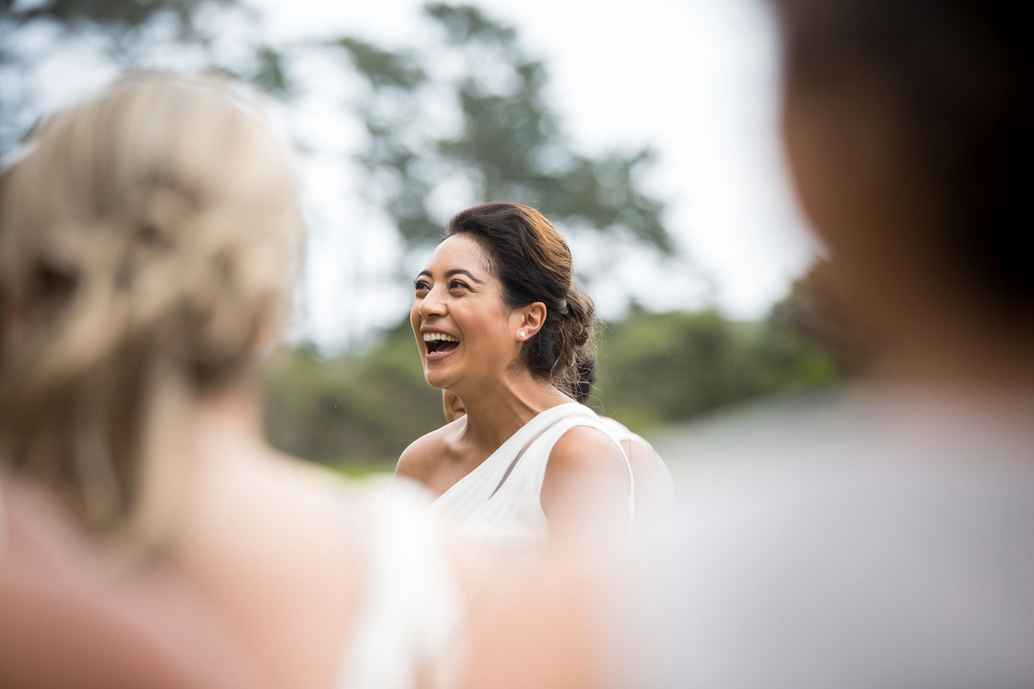 gracehill auckland wedding bridemaid laughing during the ceremony
