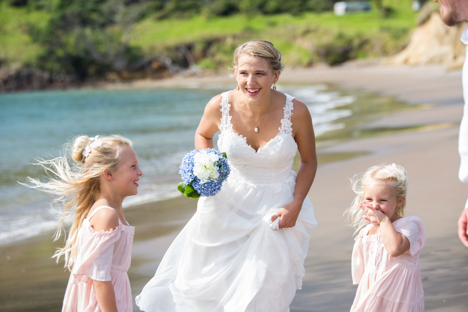 beach wedding bride laughing loud