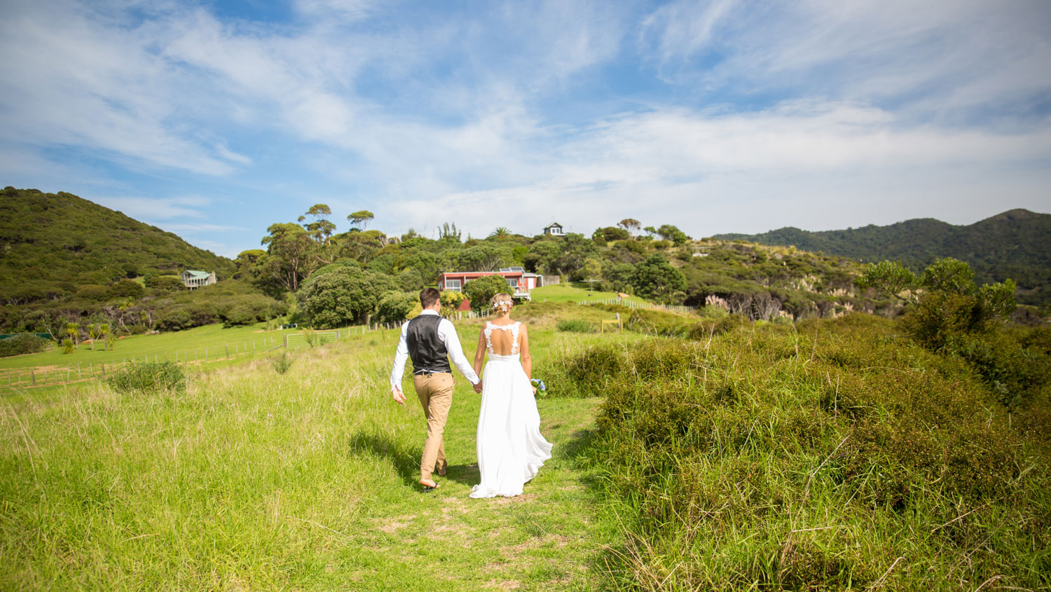 new zealand wedding couple walking away