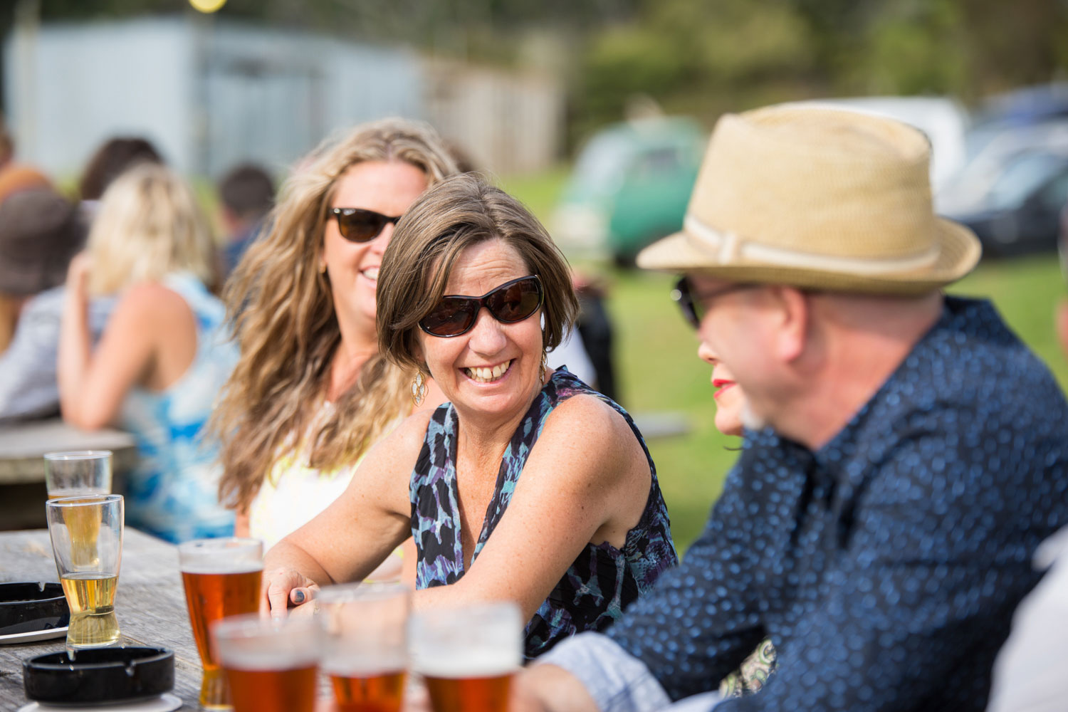 new zealand wedding guests drinking beer