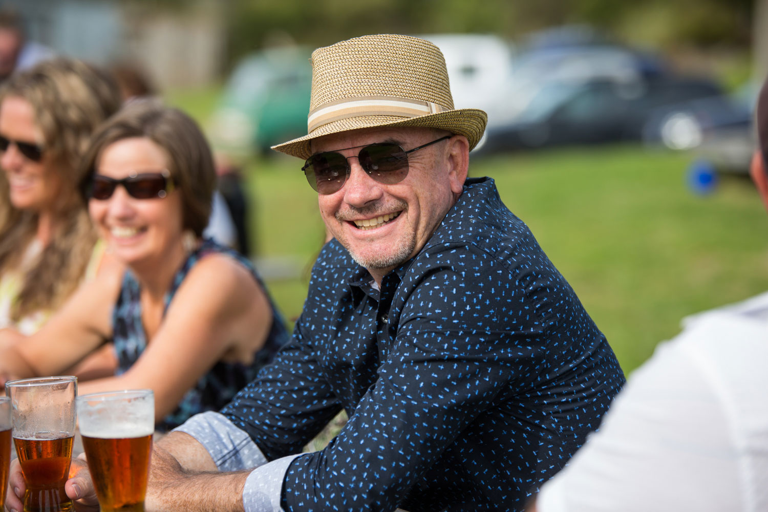 new zealand wedding guest smiling at the camera