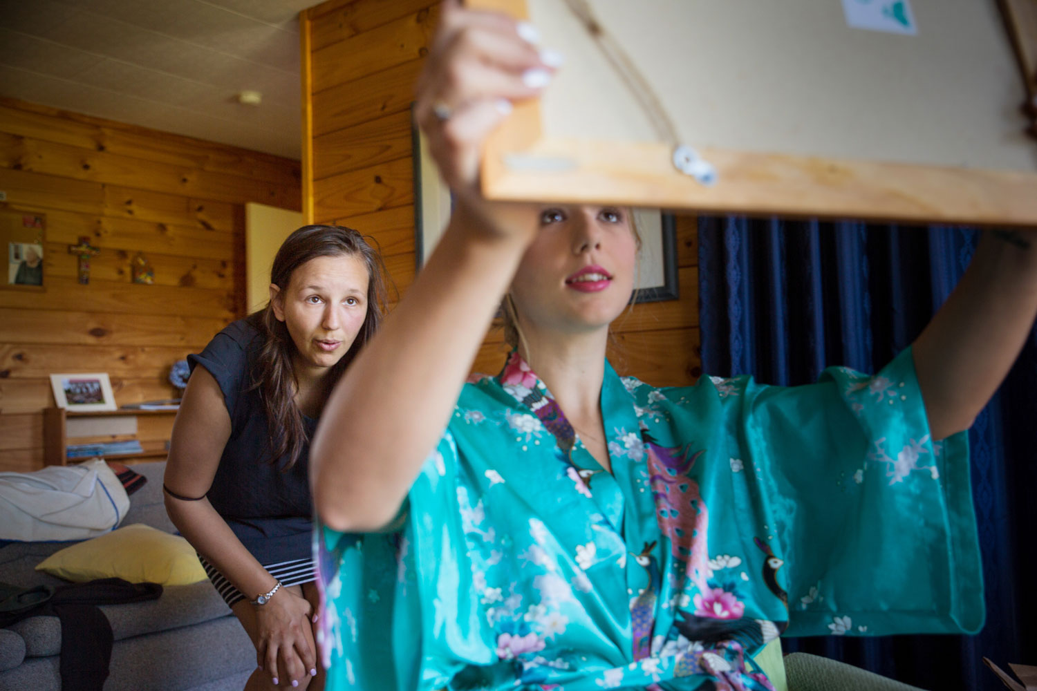 new zealand wedding bride looking at mirror