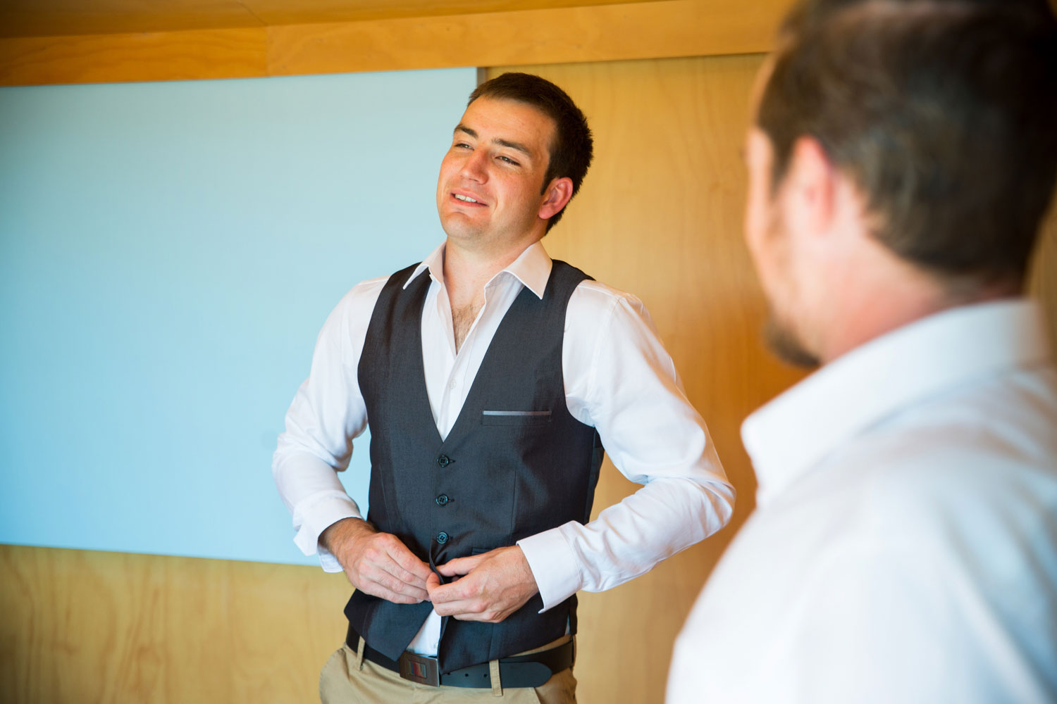 new zealand wedding groom getting ready