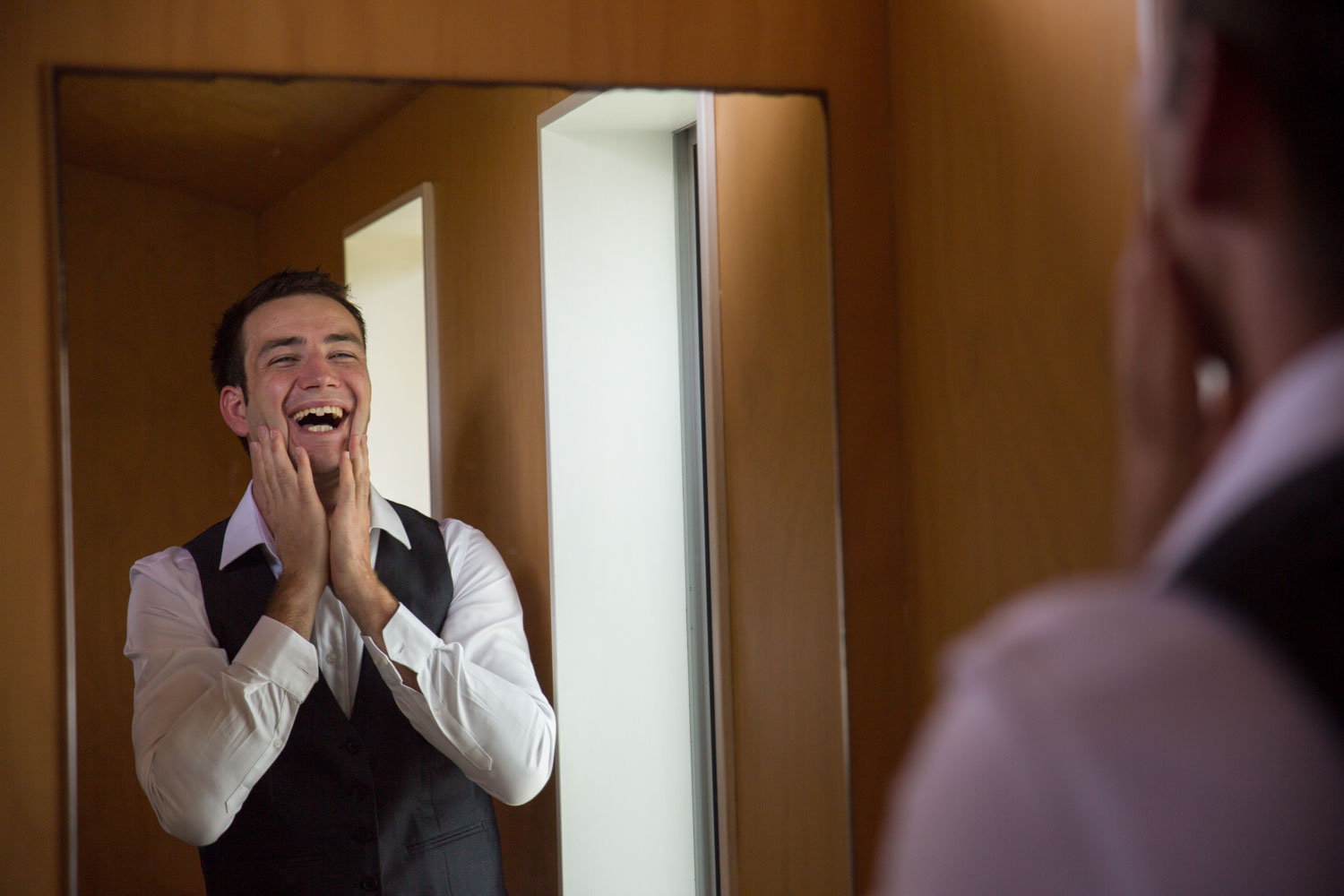 new zealand wedding groom washing face