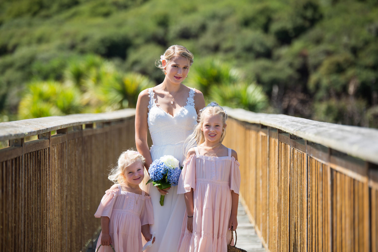 new zealand wedding bride and flowergirls