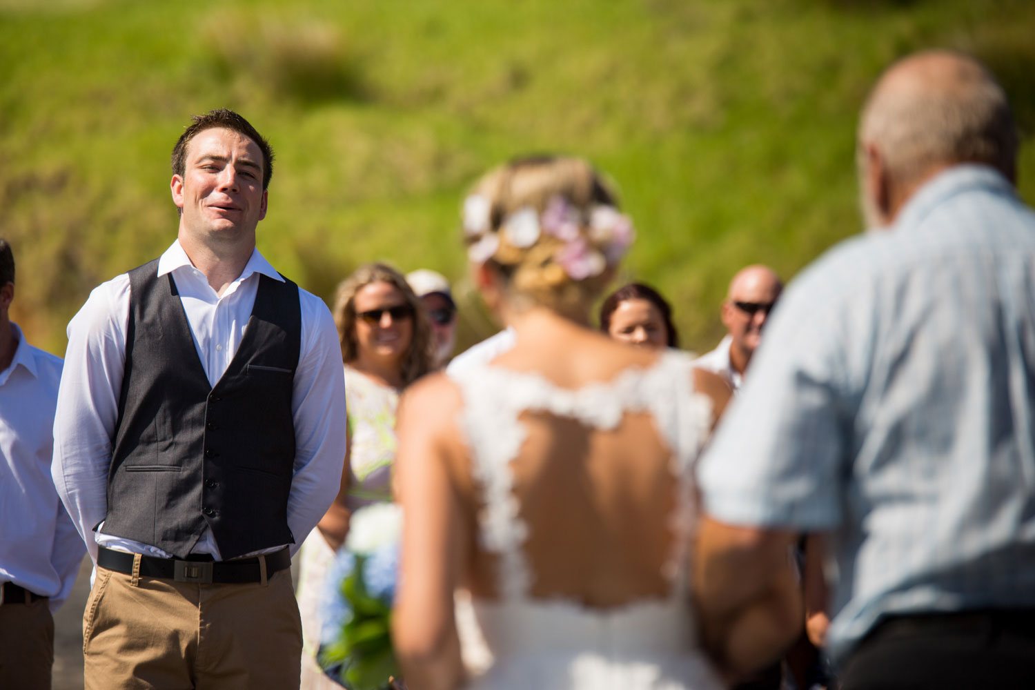 beach wedding photos groom reaction