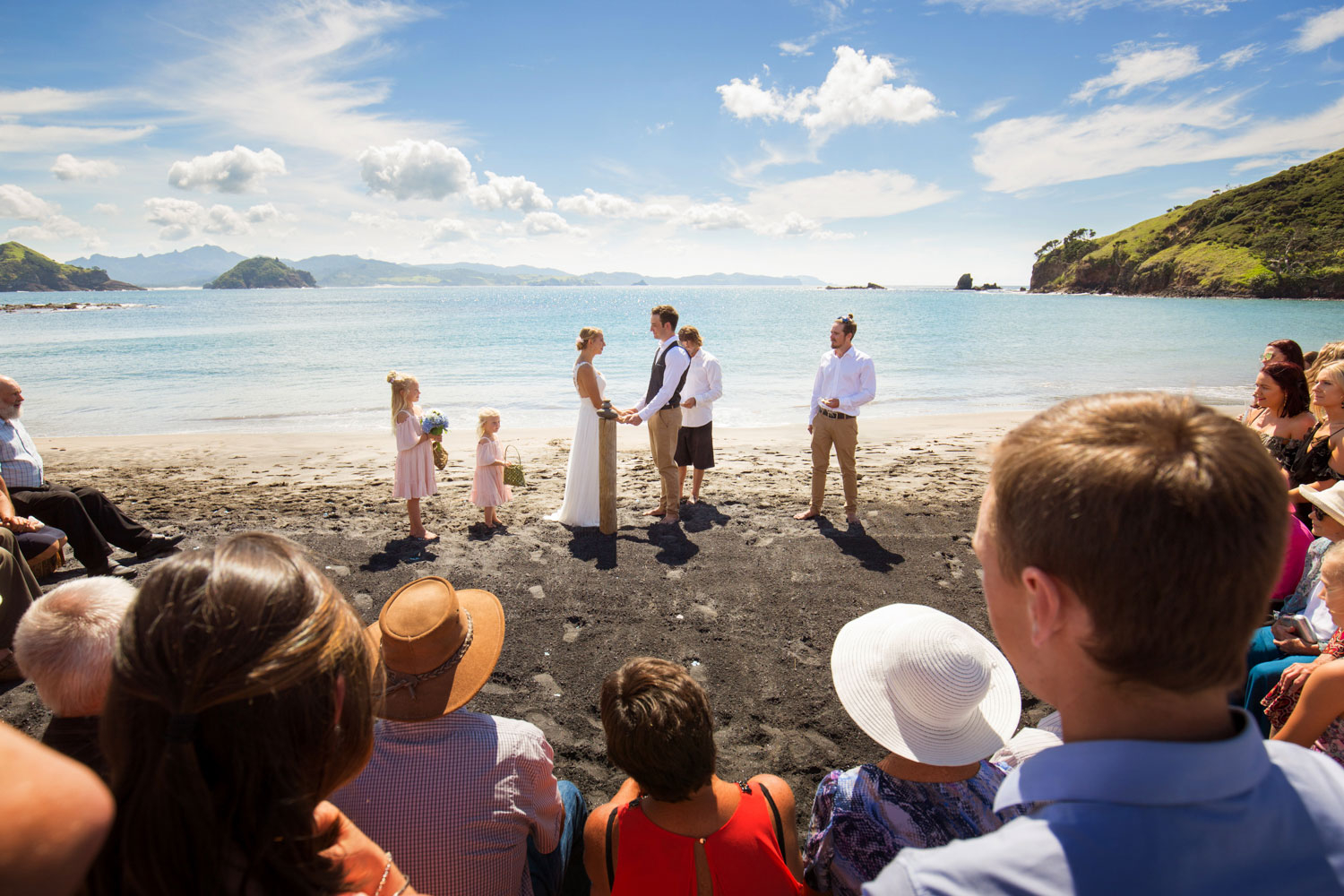 beach wedding photos ceremony in progress