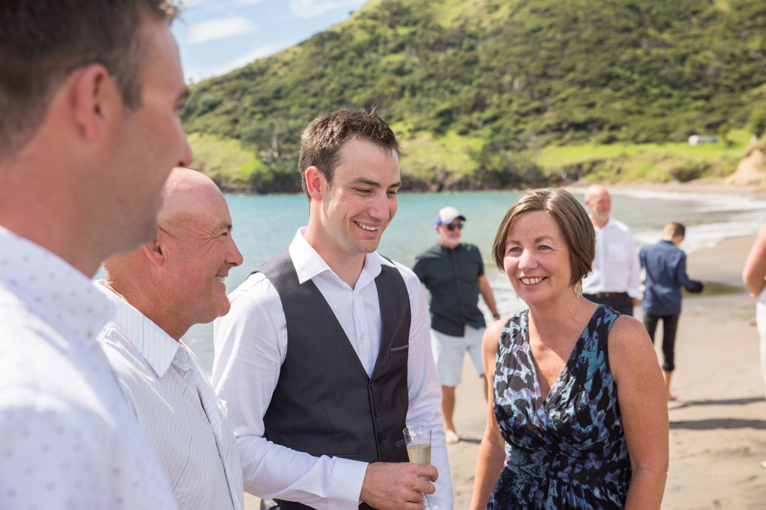 beach wedding guests enjoying themselves