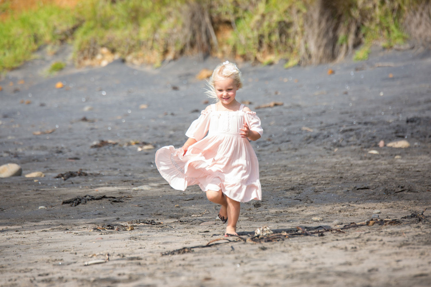 beach wedding flower girl on beach