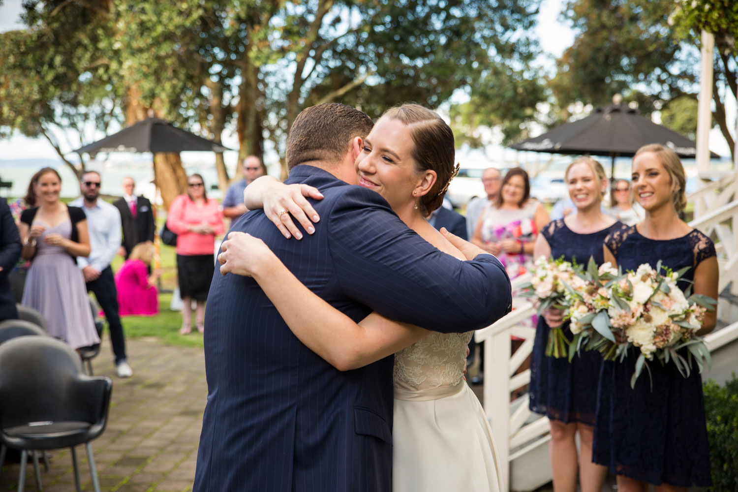 wedding photographer auckland bride and groom embrace