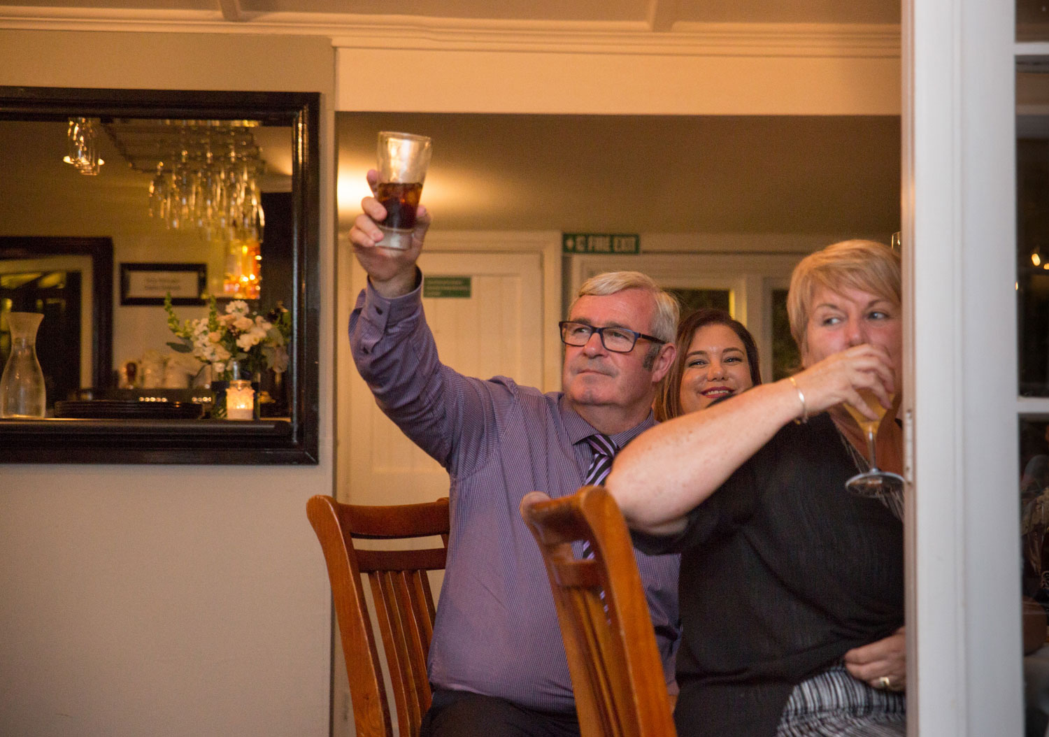 wedding photographer auckland celebrant toasting