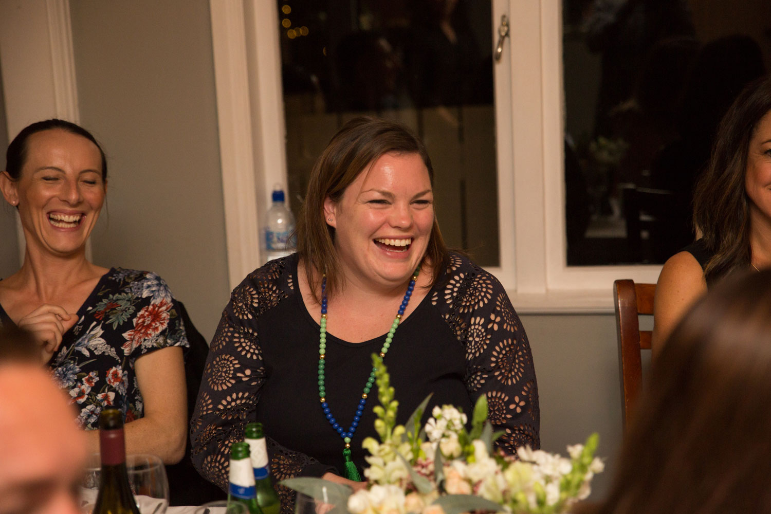 wedding photographer auckland guest laughing at joke
