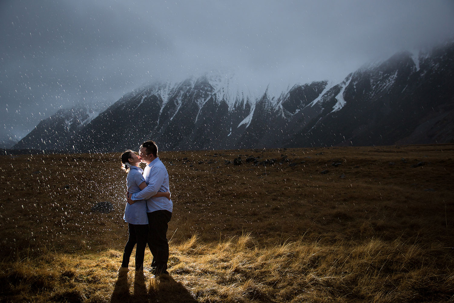 new zealand pre-wedding photo couple in the rain