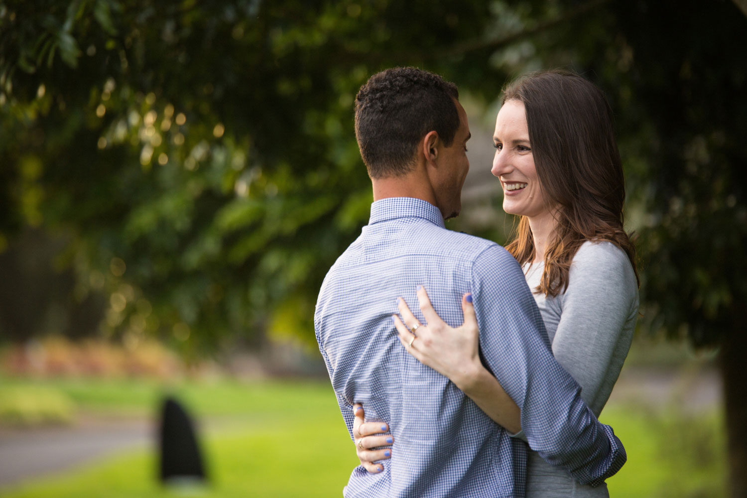 auckland botanic gardens engagement photo looking at each other