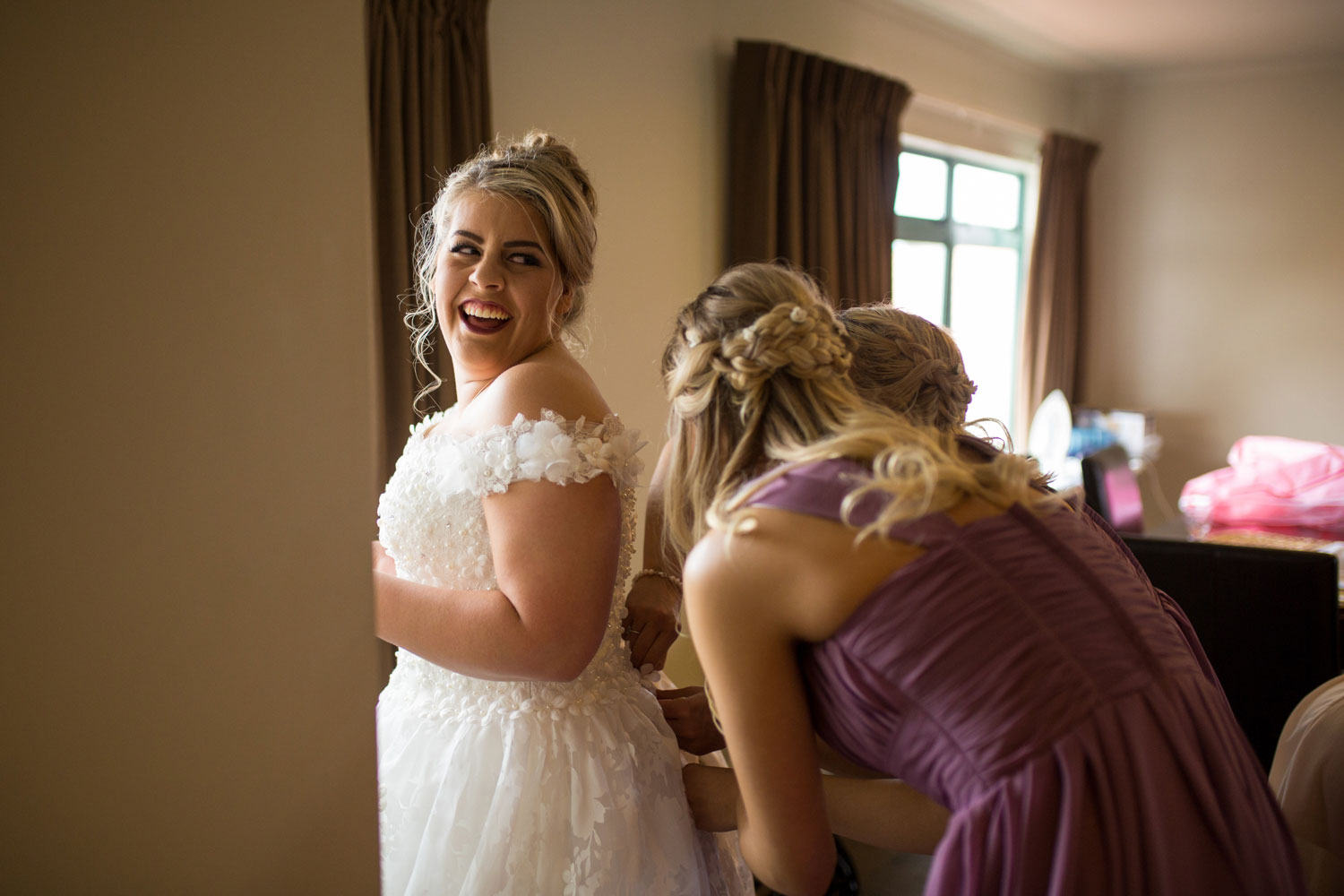 hamilton wedding bride getting ready and laughing