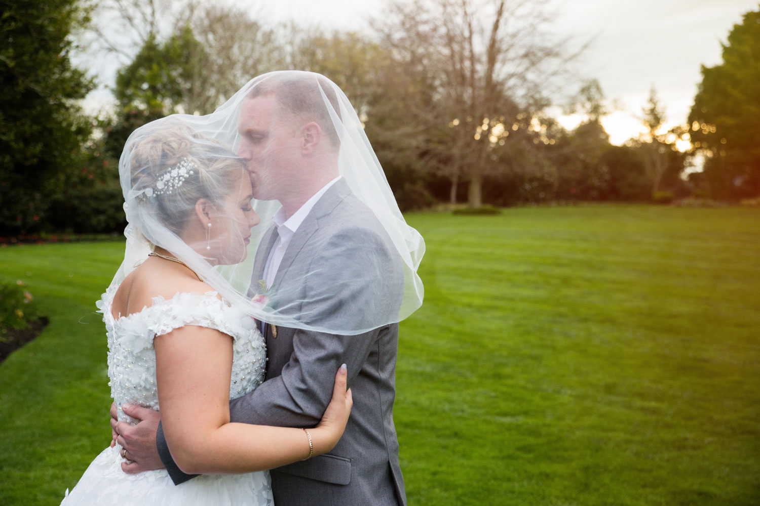 hamilton garden wedding bride and groom kissing under veil