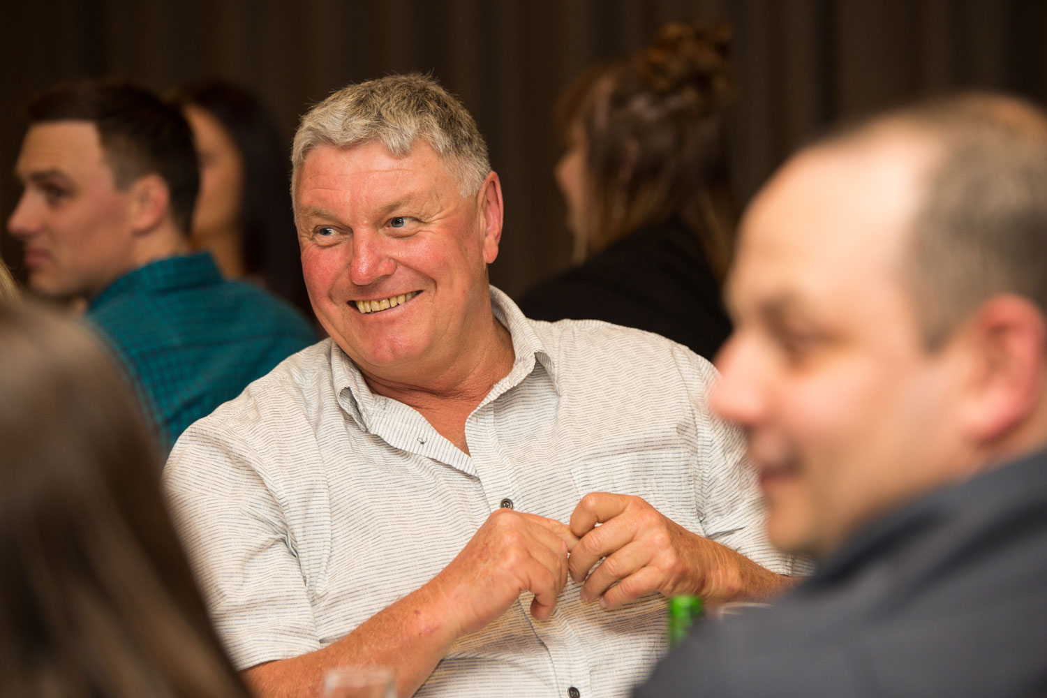 hamilton wedding guest having a laugh at the reception