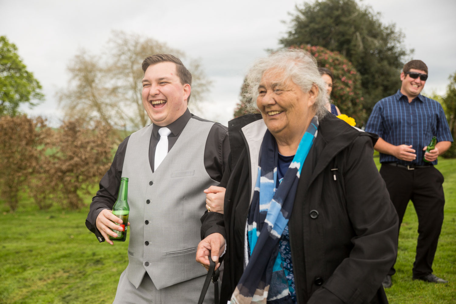 the red barn waikato wedding groom laughing with granny