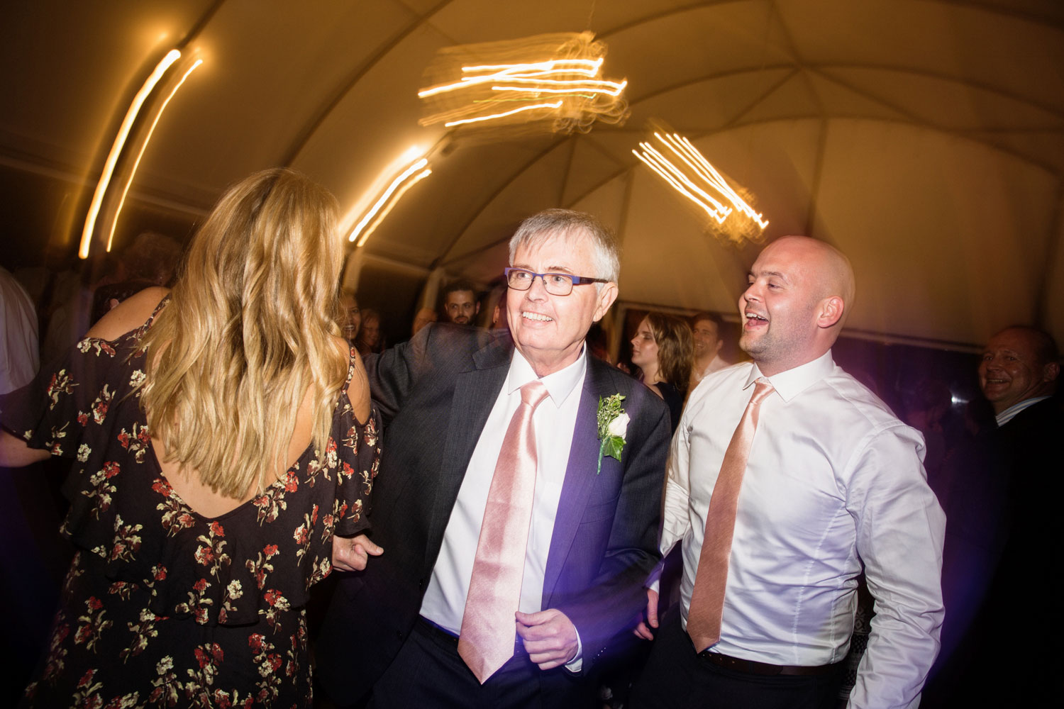 father of groom dancing