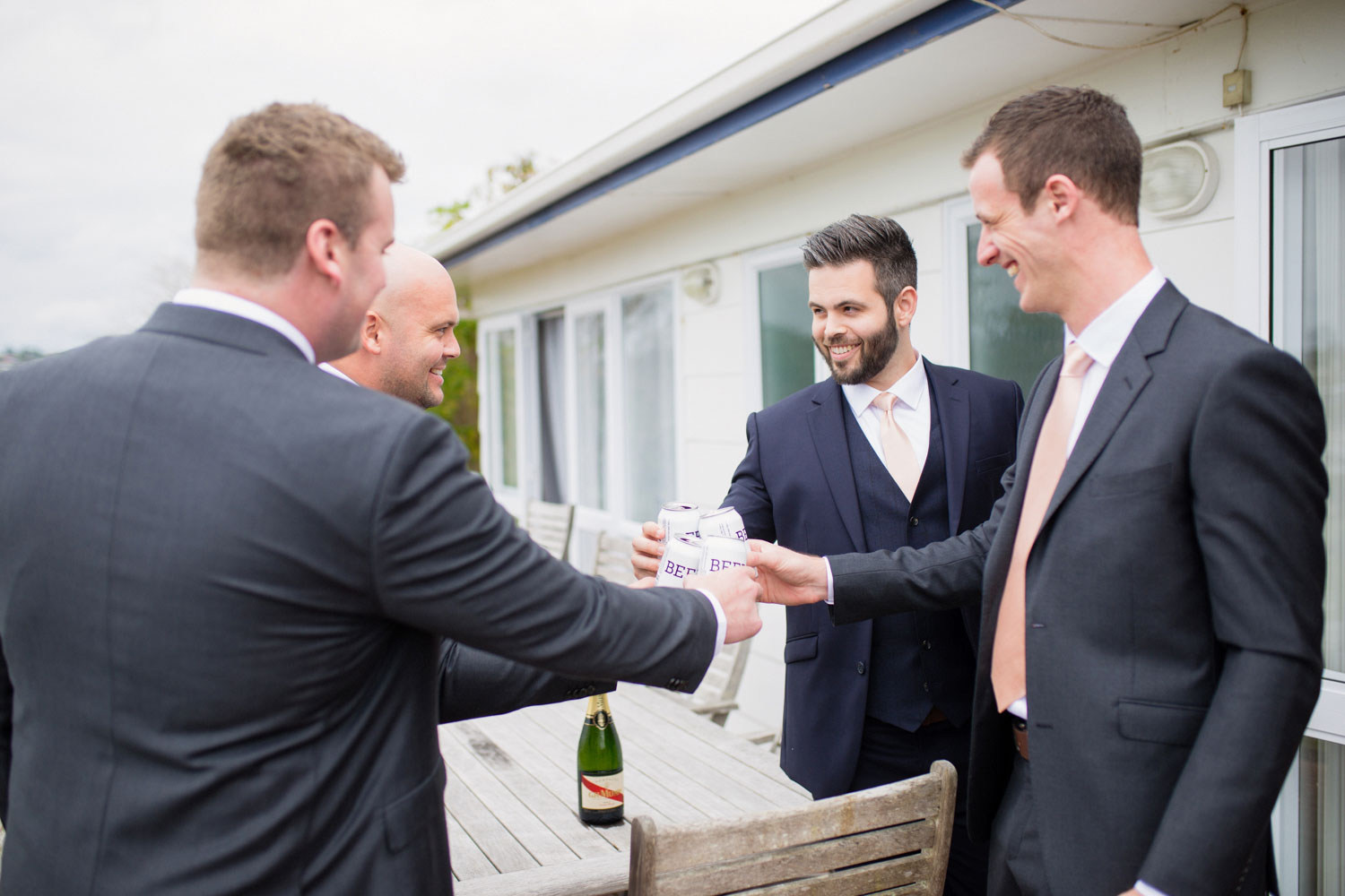 groomsmen having a beer