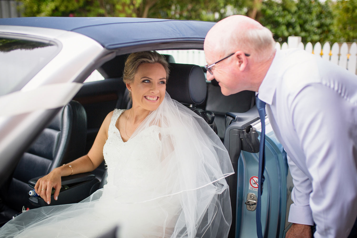 bride getting into her car