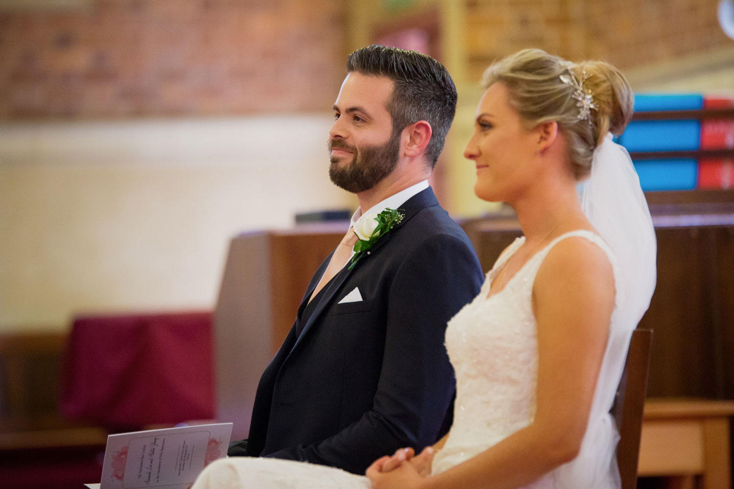 bride and groom smiling