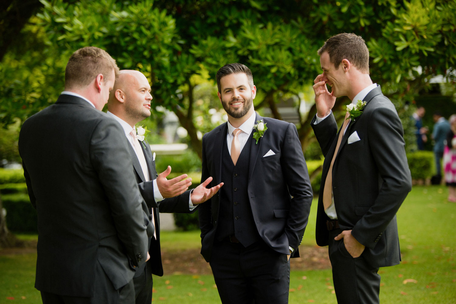 groom and groomsmen talking