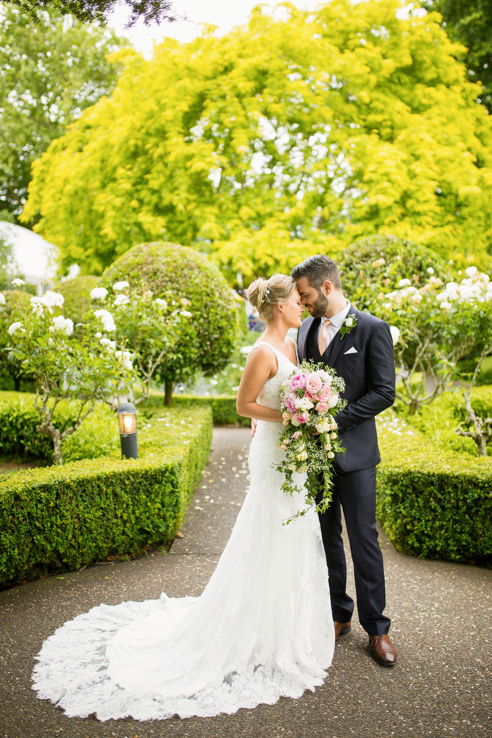 bride and groom embrace