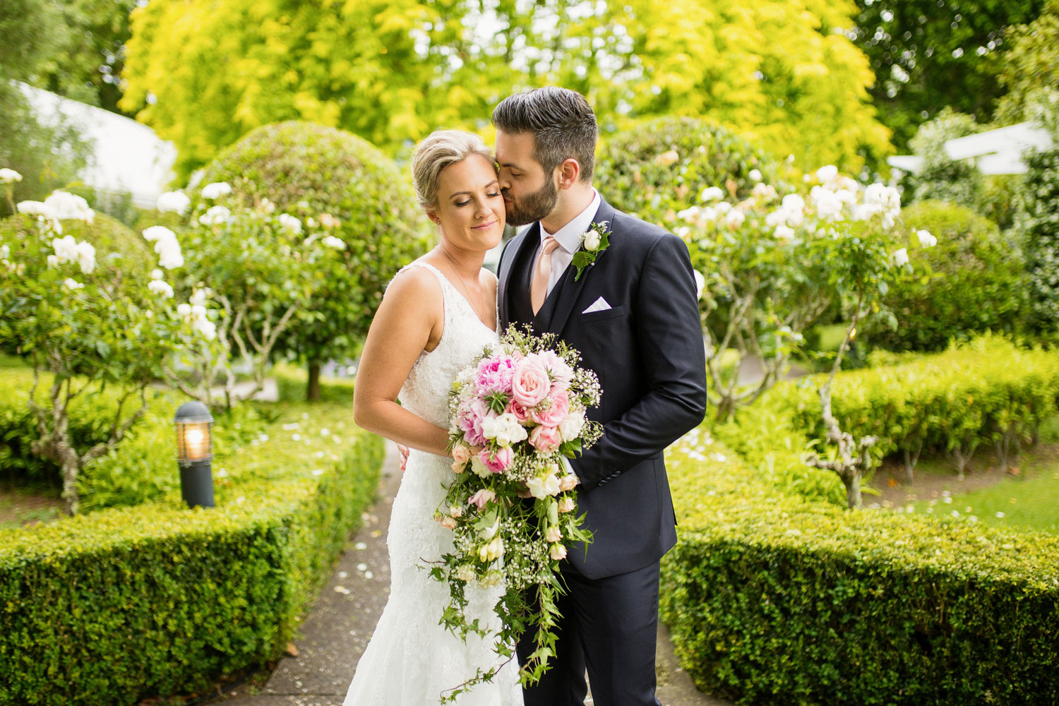 groom kissing the bride