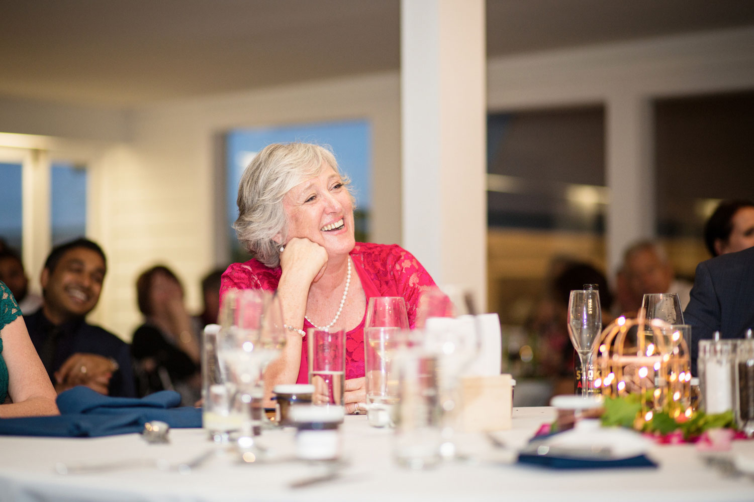 mother of the bride laughing