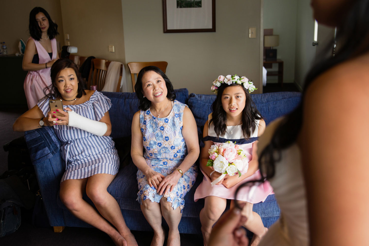 castaways waiuku wedding family looking at the bride