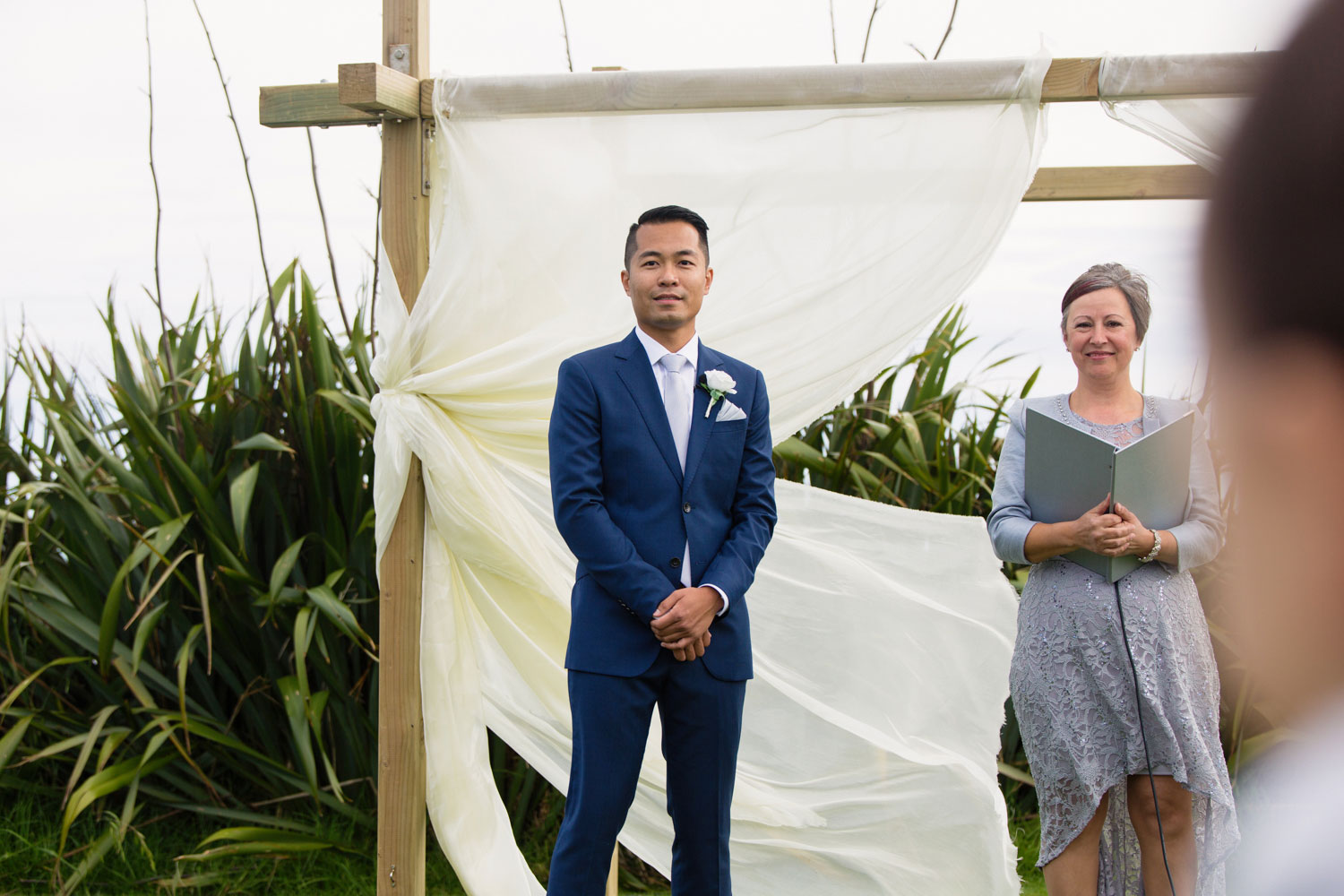 castaways waiuku wedding groom waiting for bride