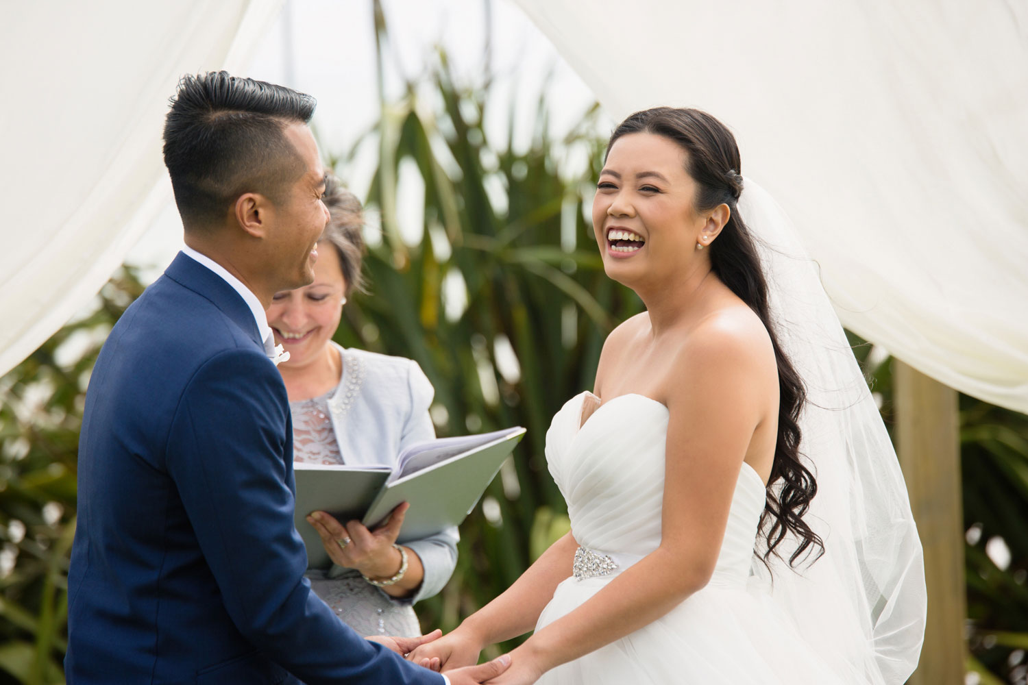 castaways waiuku wedding bride laughing