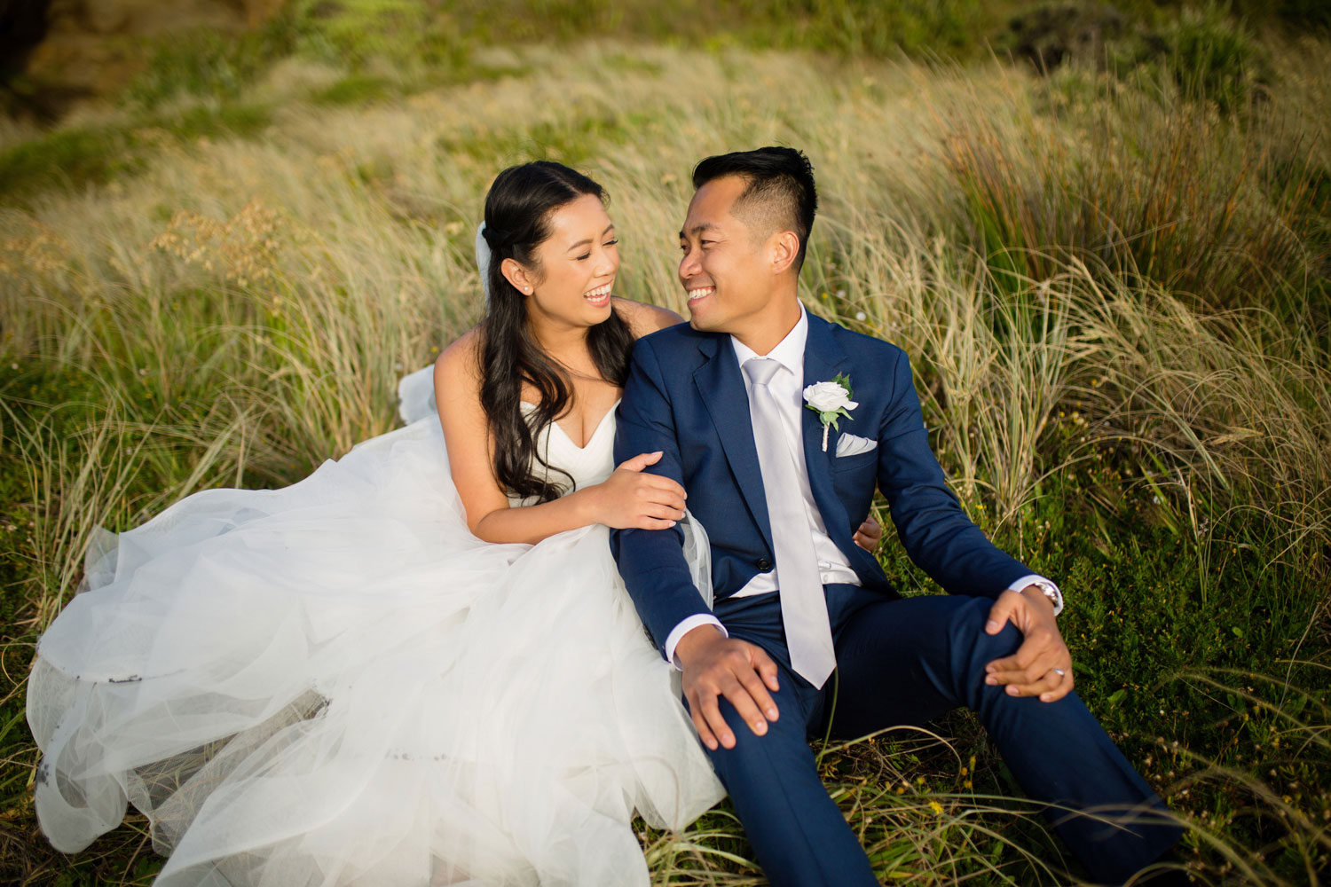 castaways waiuku wedding bride and groom having fun