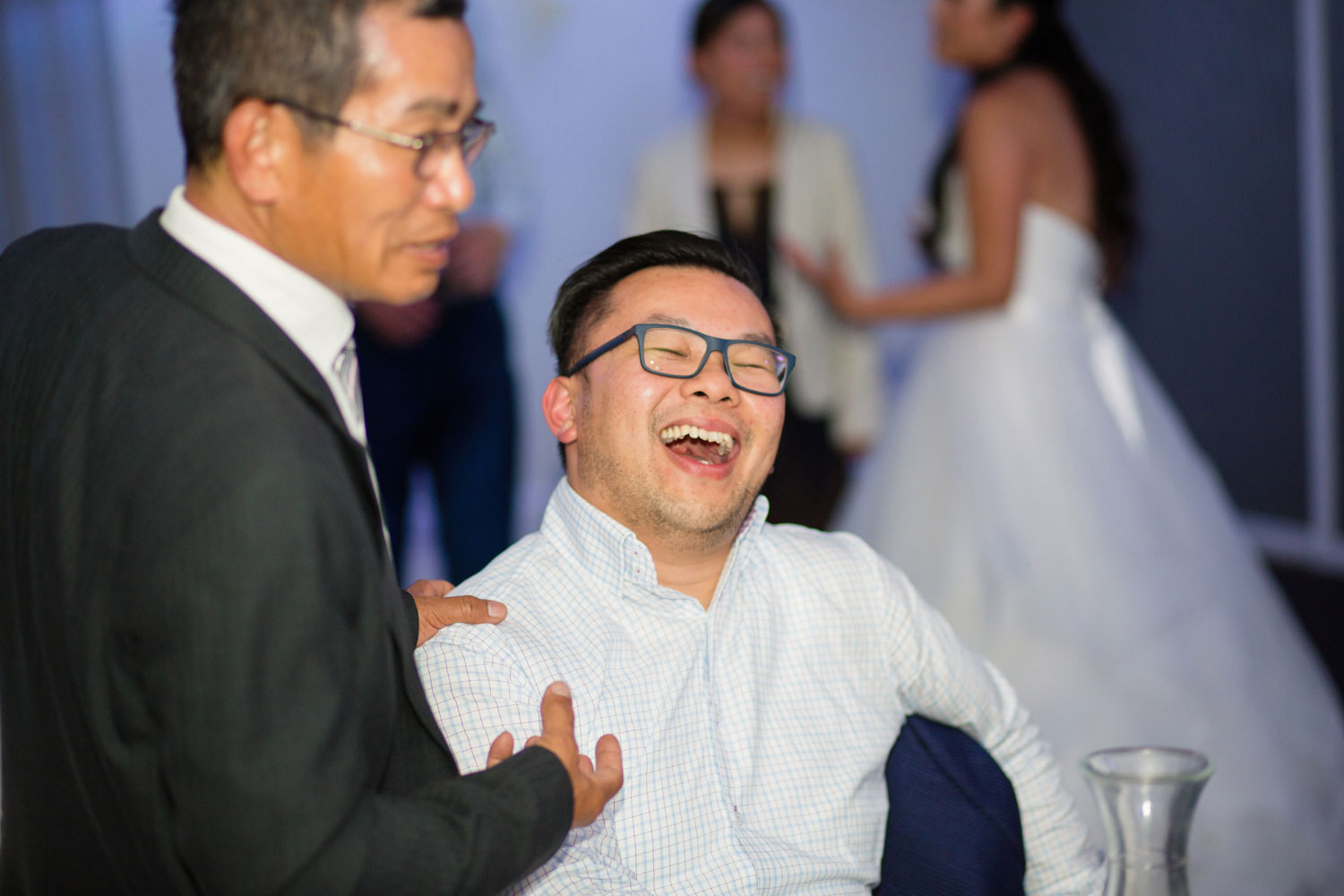 castaways waiuku wedding guest laughing