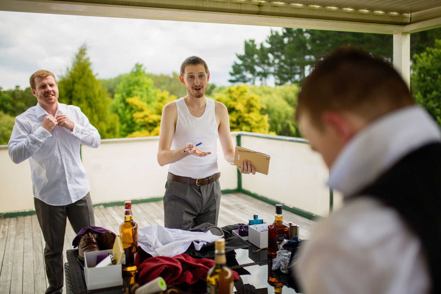 groomsmen talking