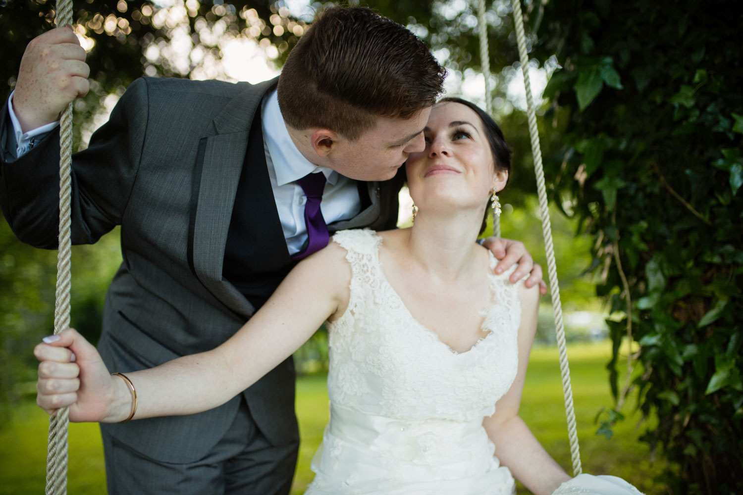 groom kissing bride