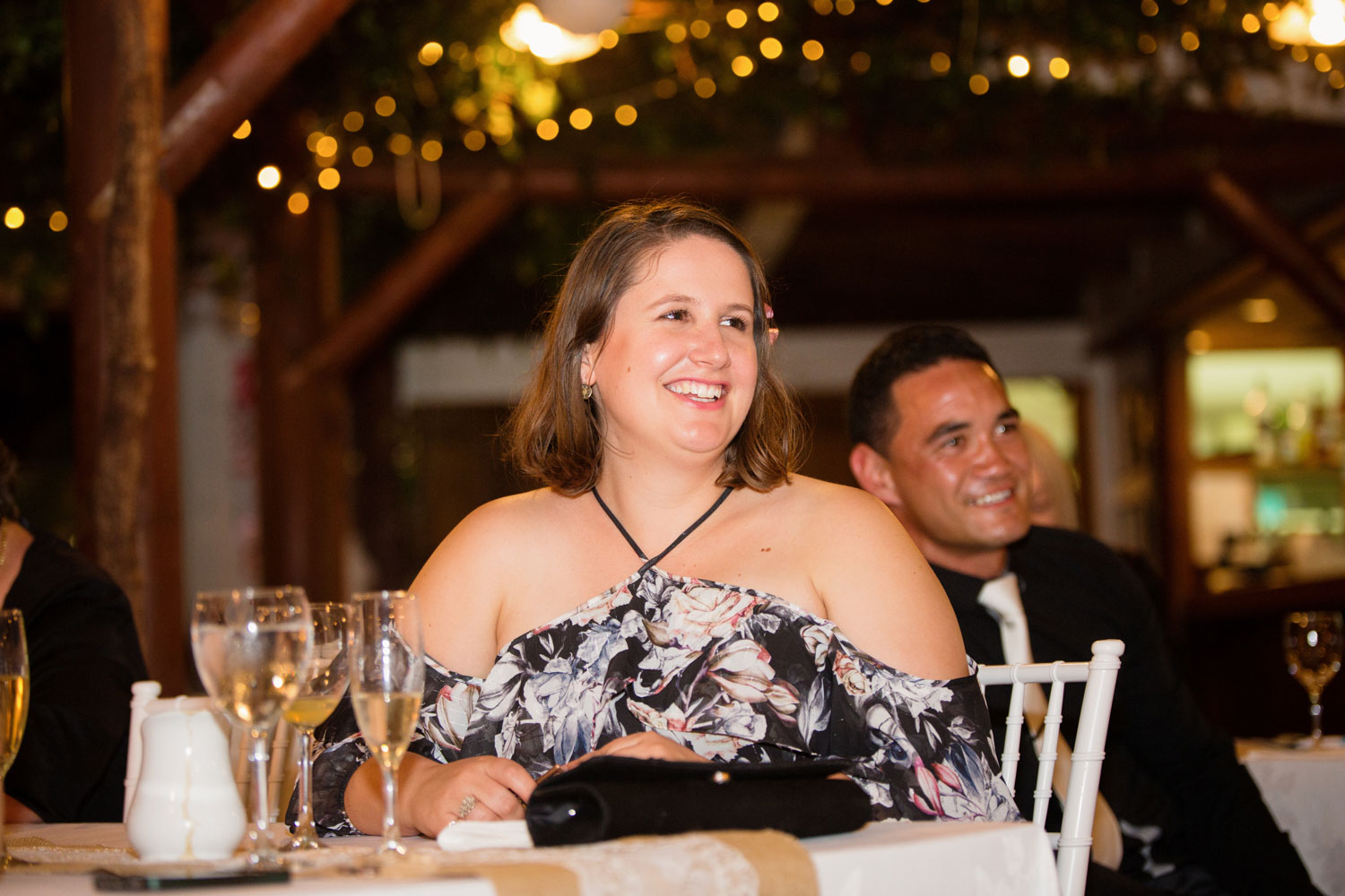 wedding guest smiling