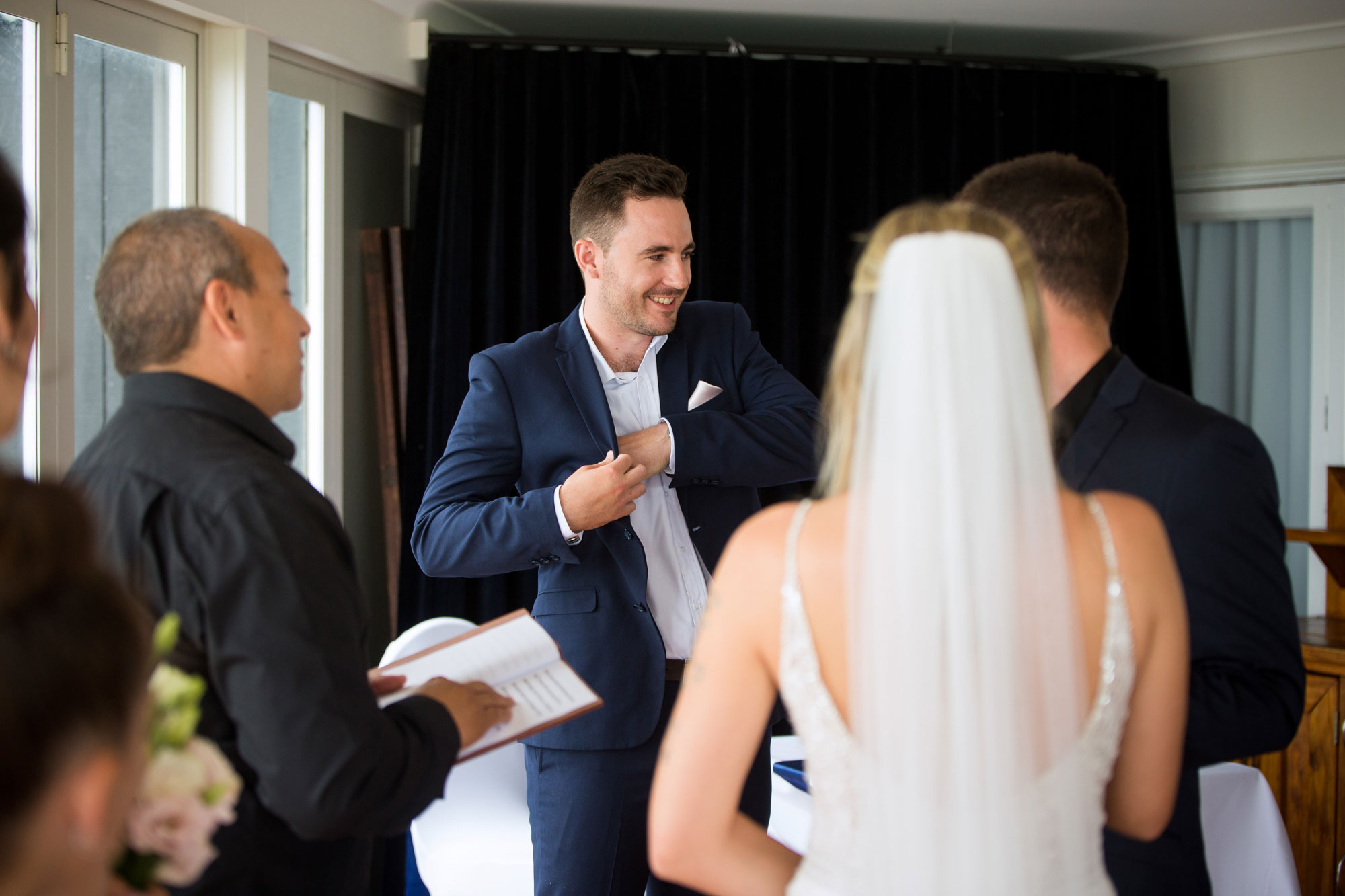 best man with wedding rings