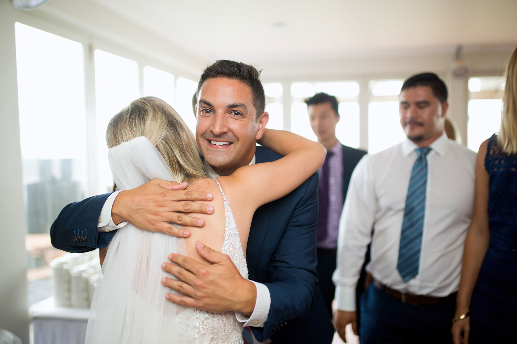 guests congratulating bride