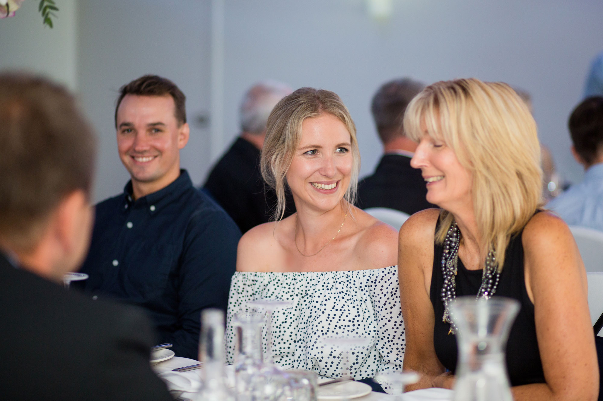 wedding guest smiling