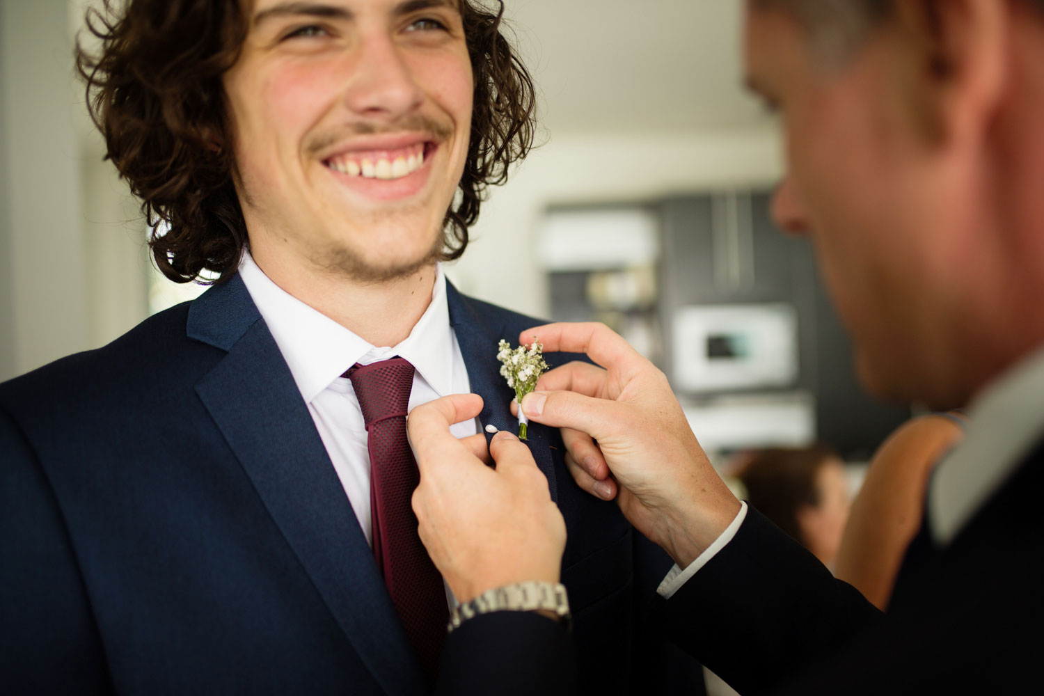 groomsman smiling