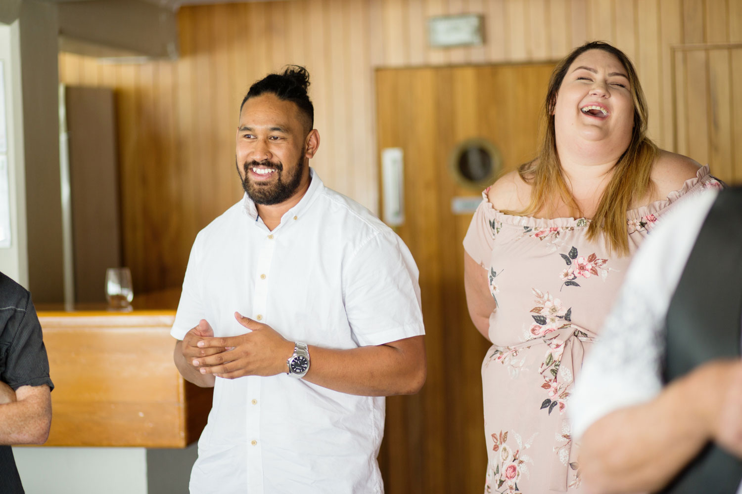 wedding guests laughing