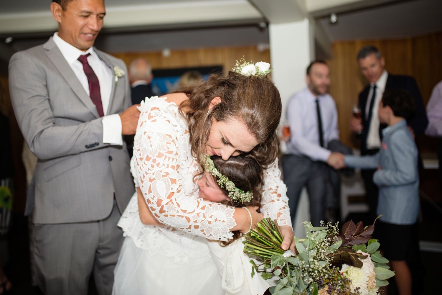 bride hugging girl