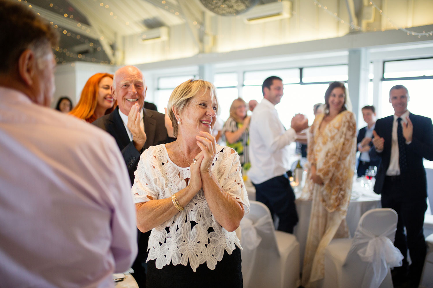 wedding guest clapping