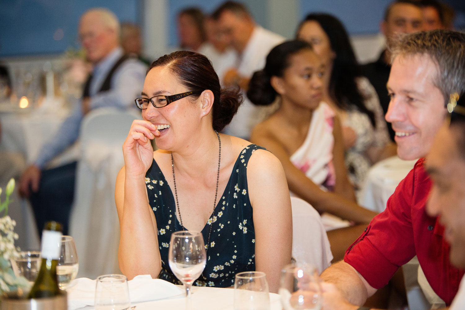 wedding guest laughing