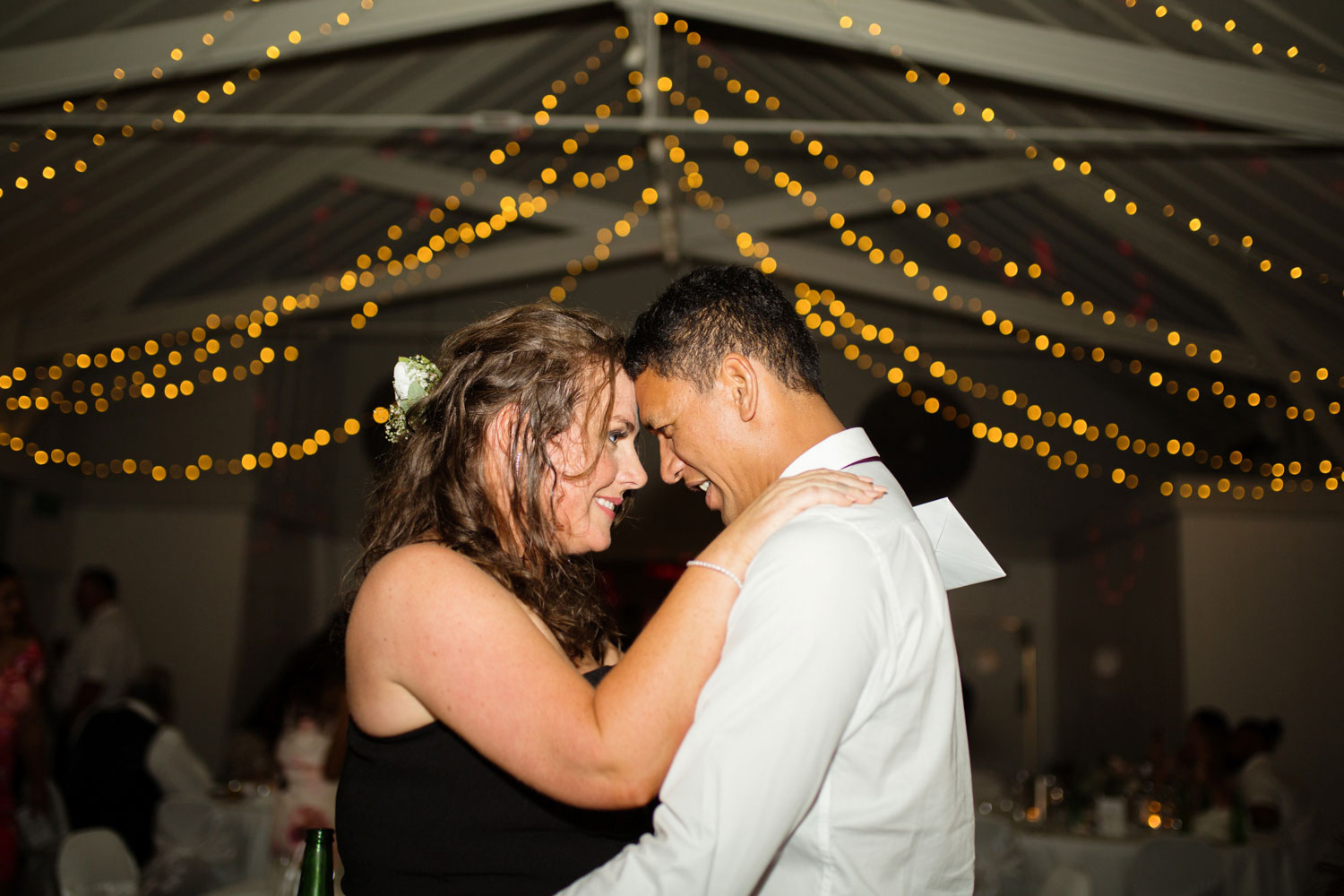 bride and groom embrace